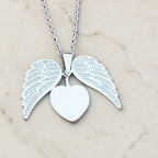 Custom laser-engraved angel wing hidden message locket necklace — handcrafted Louisiana personalized jewelry