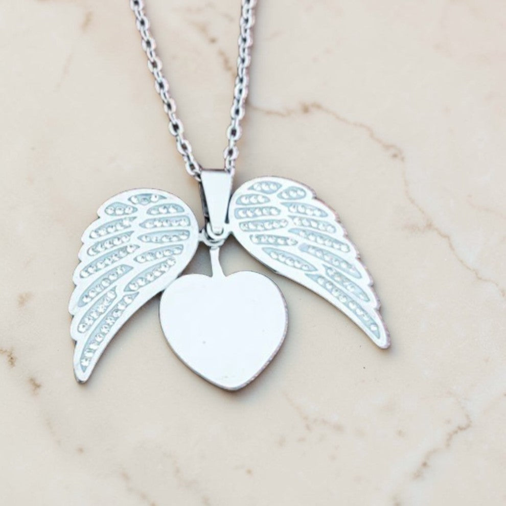 Custom laser-engraved angel wing hidden message locket necklace — handcrafted Louisiana personalized jewelry