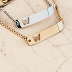 Custom laser-engraved butterfly bar bolo style stainless steel bracelet — handcrafted Louisiana personalized jewelry