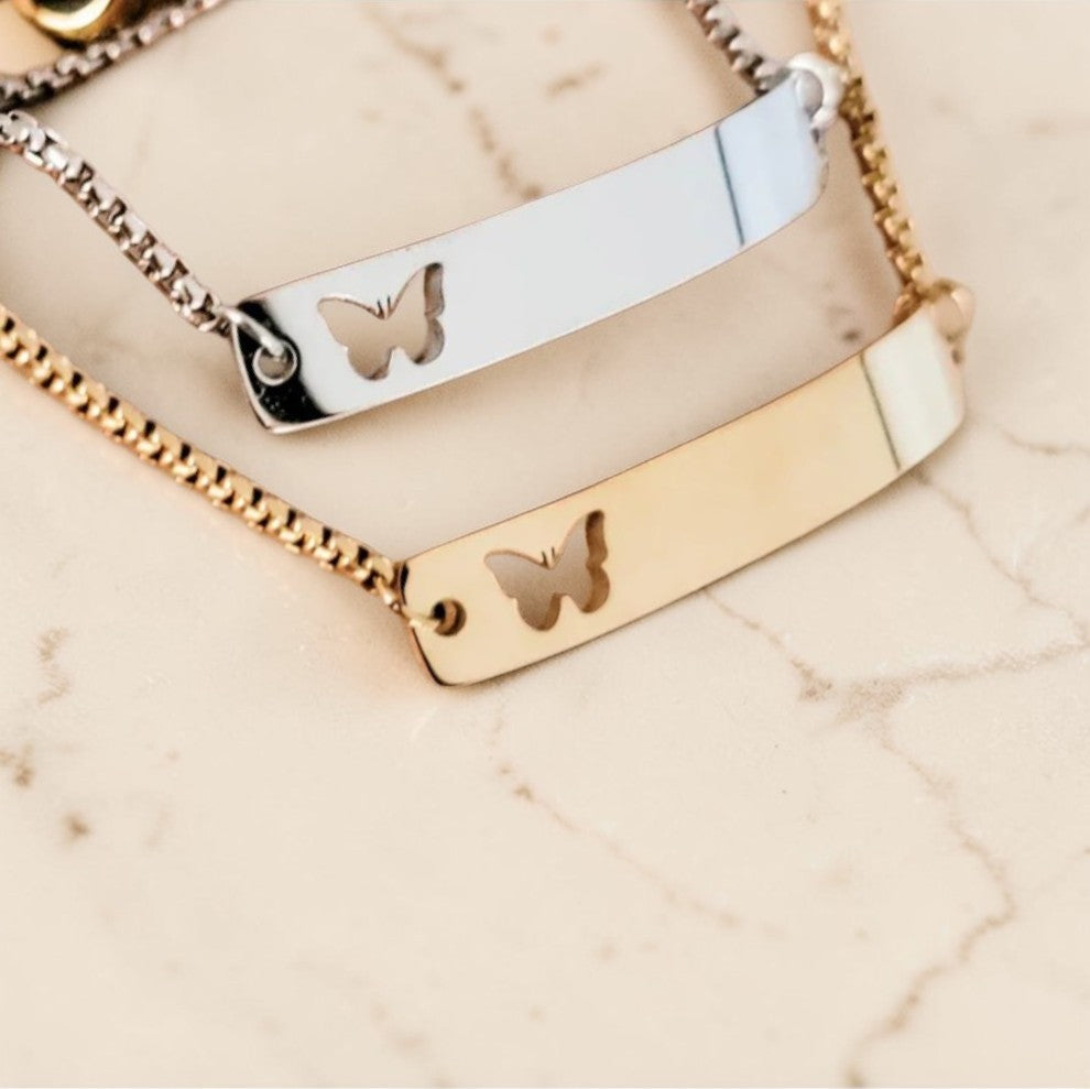 Custom laser-engraved butterfly bar bolo style stainless steel bracelet — handcrafted Louisiana personalized jewelry