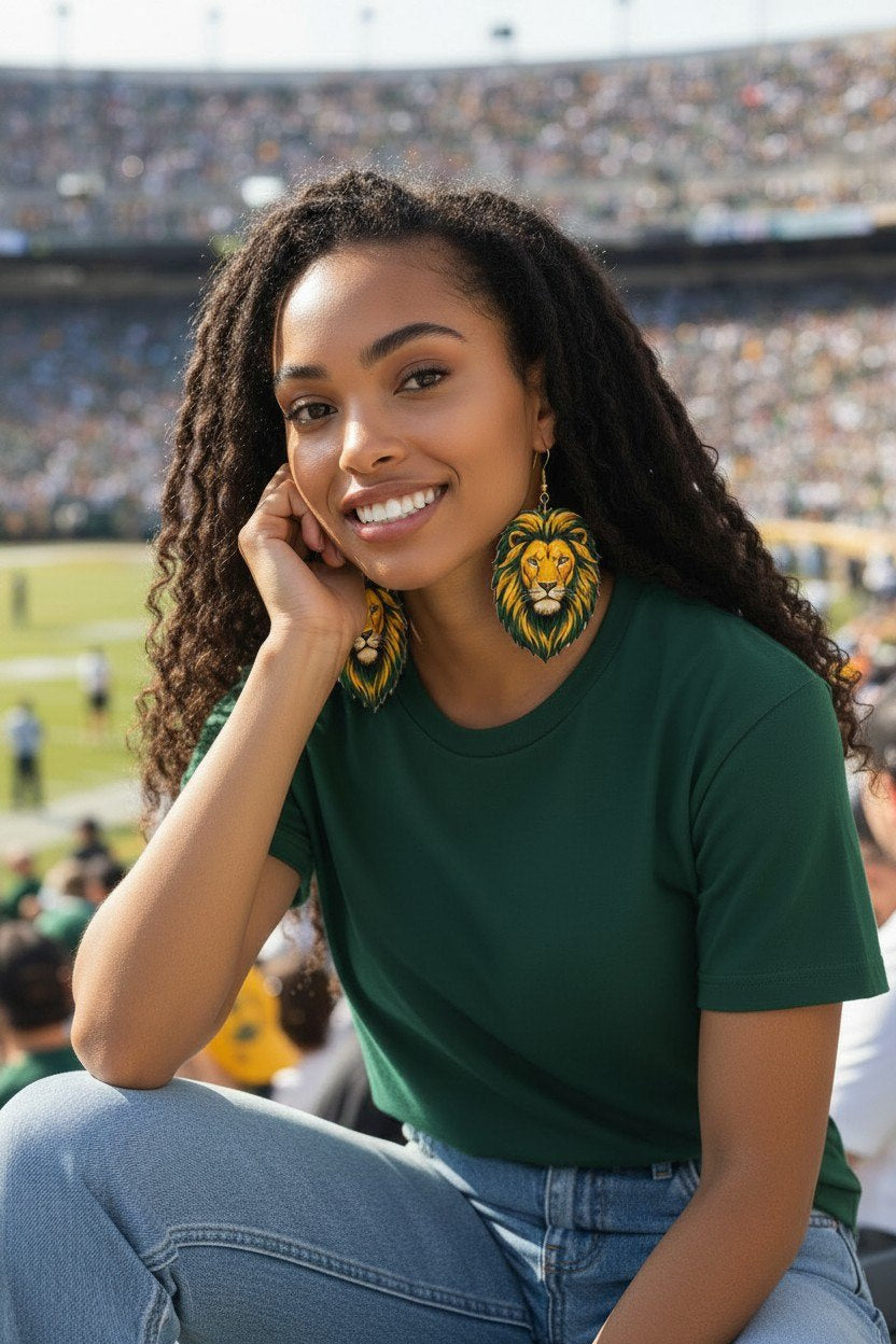 Woman wearing Lion Up earrings at football stadium