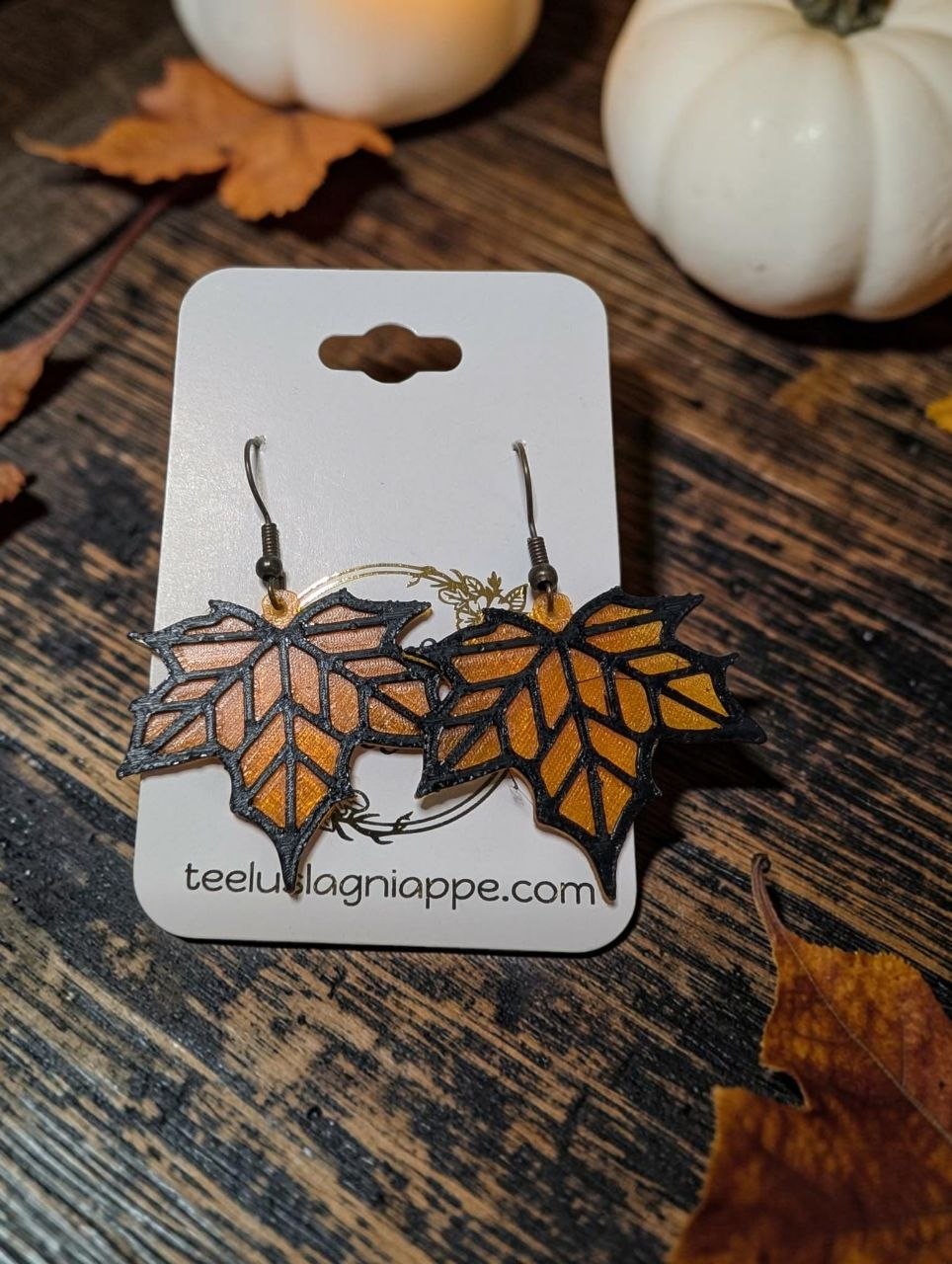 Fall Leaf earrings - 3D printed translucent orange maple leaf earrings with black geometric frame