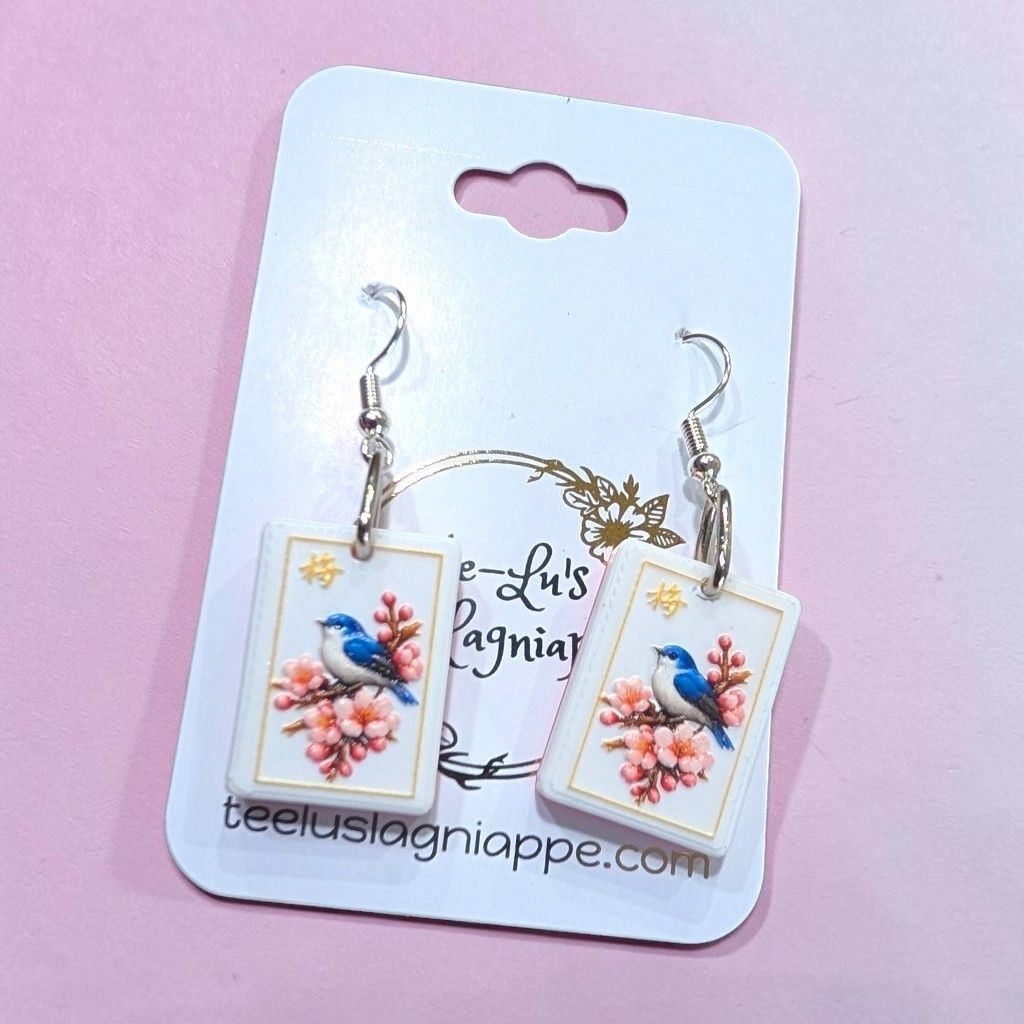 Mahj Blossom Bird earrings - bluebird on cherry blossom mahjong tile, styled view