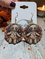 Louisiana Voodoo Doll earrings on display card - 3D UV printed Halloween earrings